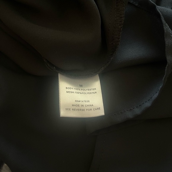 Women’s size medium, long sleeve, sheer and pleated blouse. - Picture 5 of 7